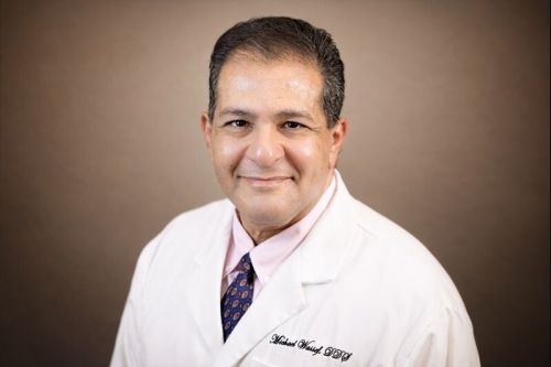 Picture of Dr. Michael Wassef in white lab coat